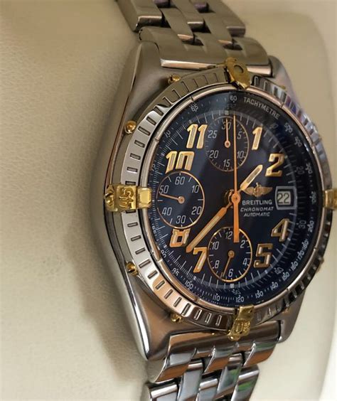 cerco cinturino x orologio breitling chronomat acciaio e oro usato|Accessori/ricambi Breitling .